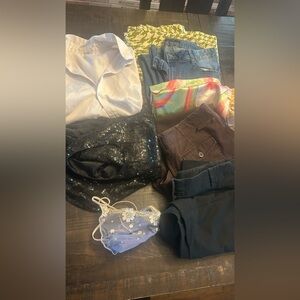 Woman’s large clothing bundle